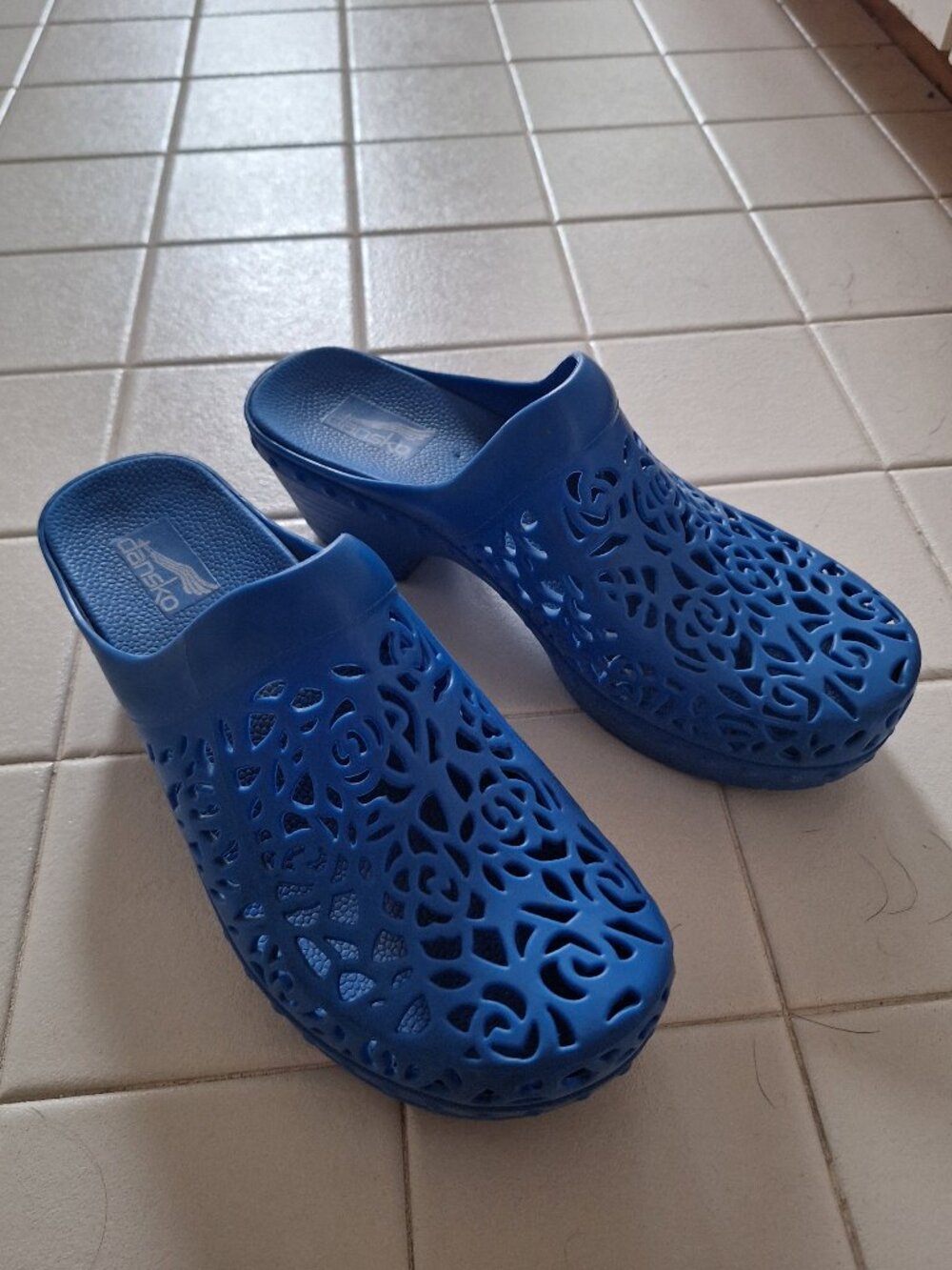 Dansko blue floral cutout clogs